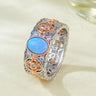 【958】Dual - Tone Floral Openwork Ring: Synthetic Opal Center with Cubic Zirconia Border - Queenou Jewelry