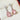 【961】Pink Pear Zirconia Drop Earrings with White Accents & Dangling Motion - Queenou Jewelry